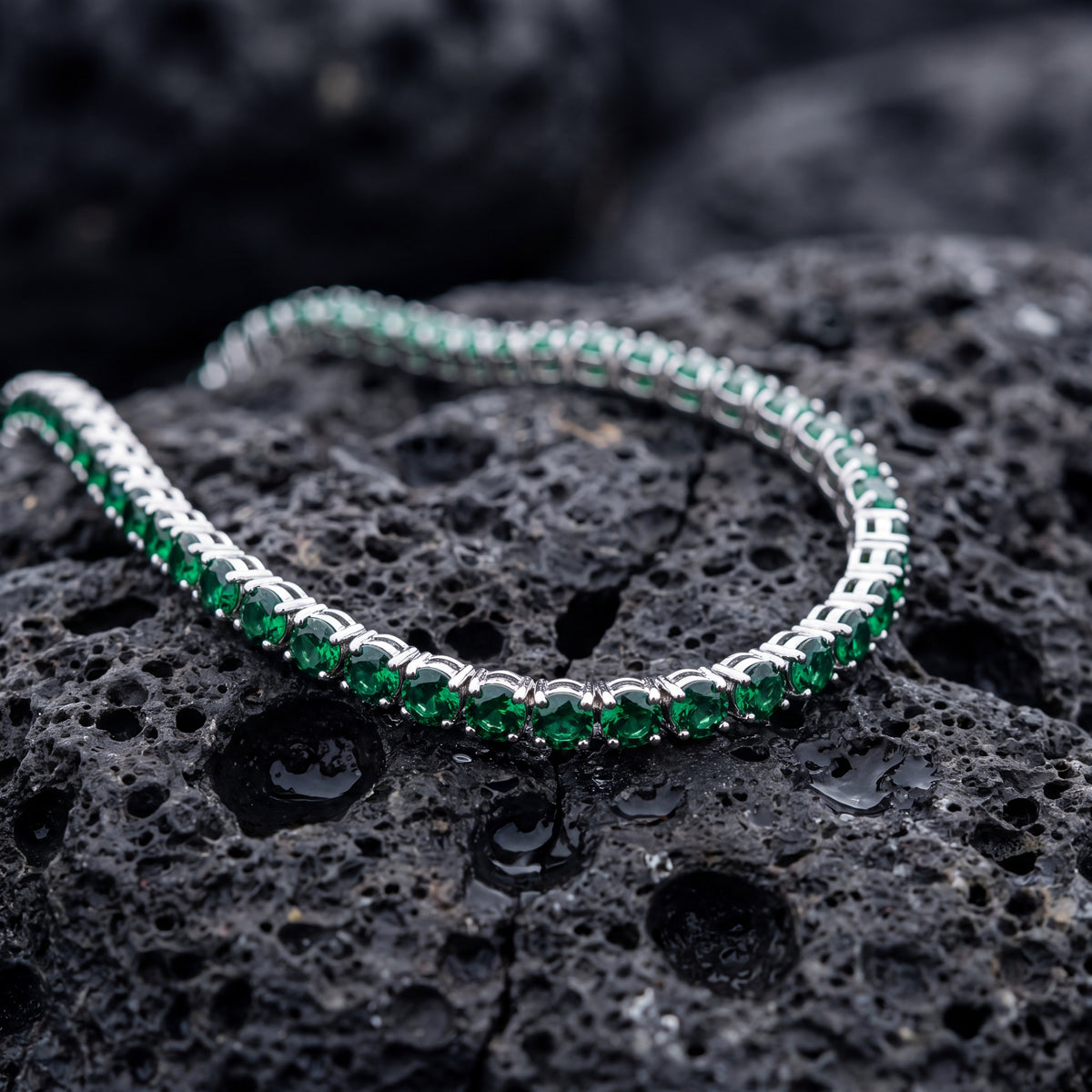 Green Day Chain laid on wet basalt