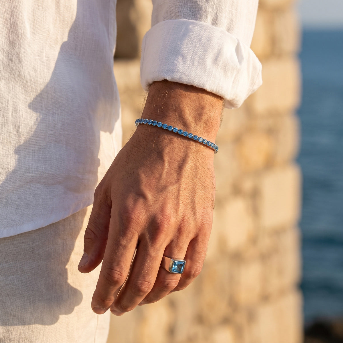 Aqua Capri Signet Ring worn with the matching tennis bracelet