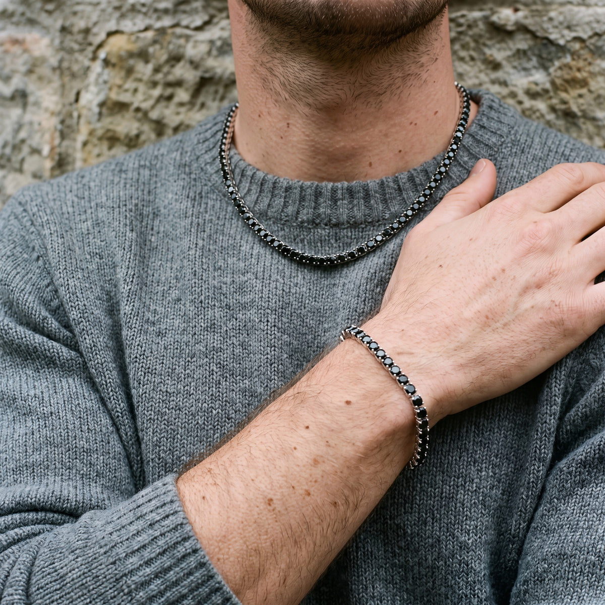 Man wearing the Onyx tennis chain and Midnight bracelet together